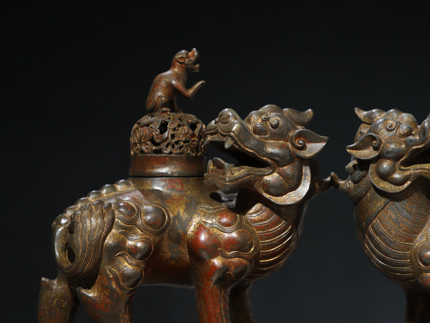 A pair of Chinese antique pure copper auspicious beast ornaments