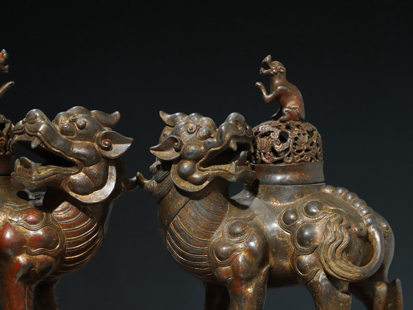 A pair of Chinese antique pure copper auspicious beast ornaments