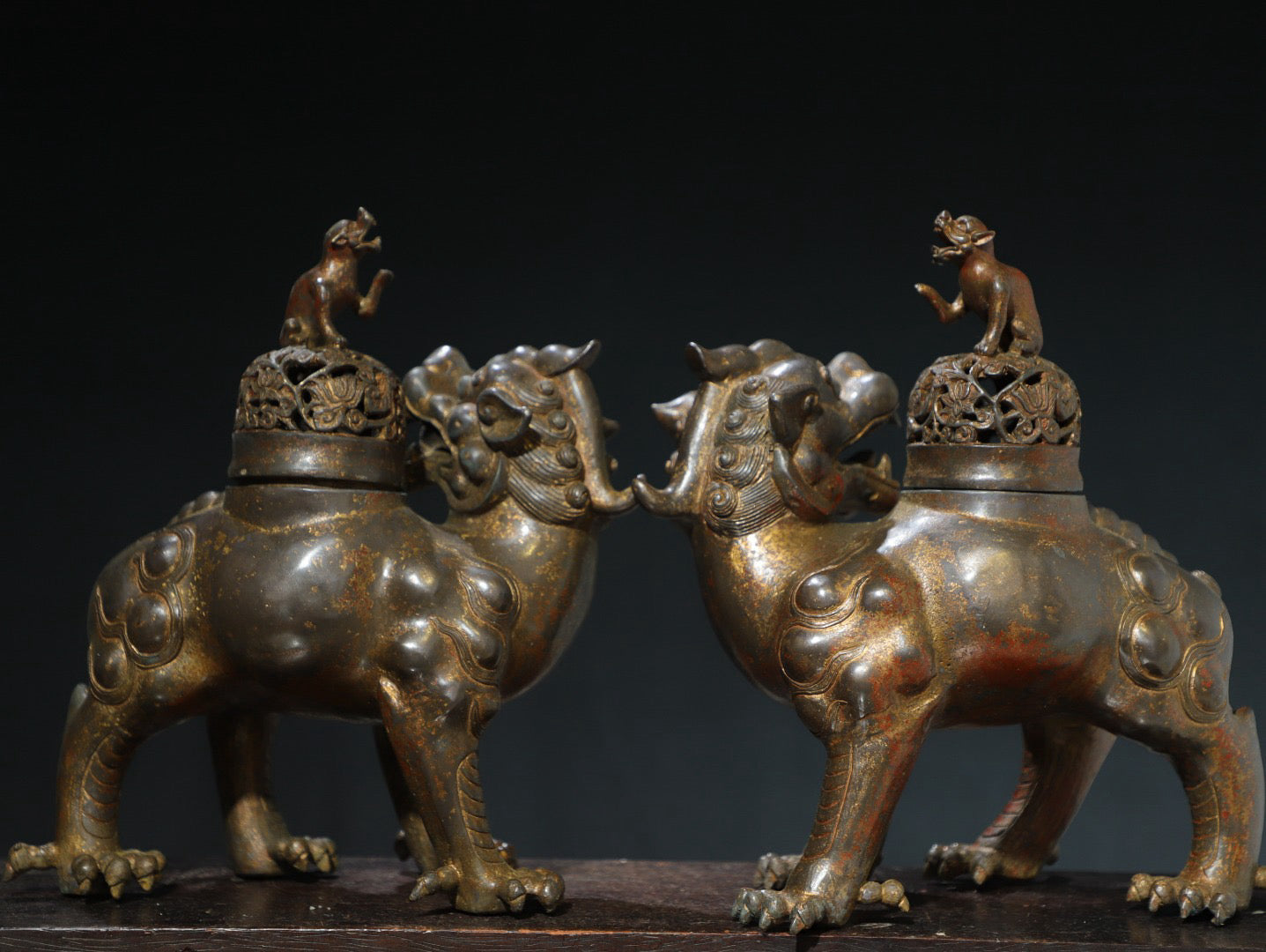 A pair of Chinese antique pure copper auspicious beast ornaments