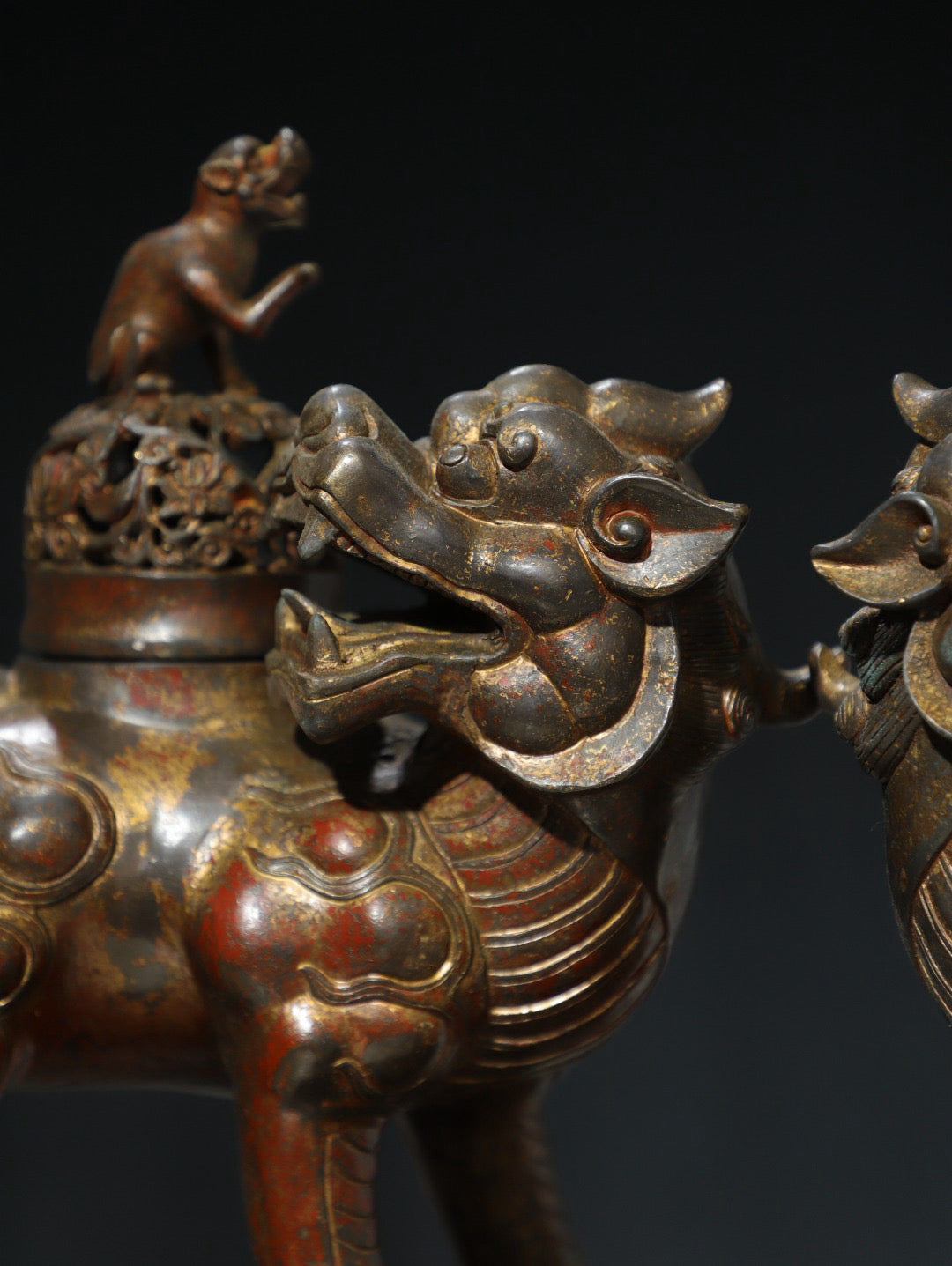 A pair of Chinese antique pure copper auspicious beast ornaments