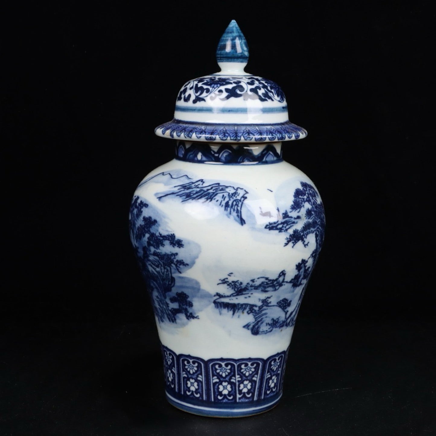 Blue and white landscape pattern general jar