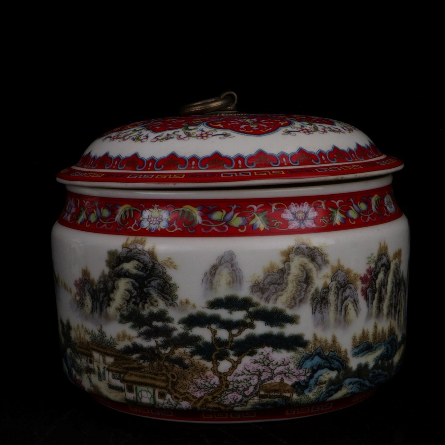 Pink landscape picture and text red roof jar