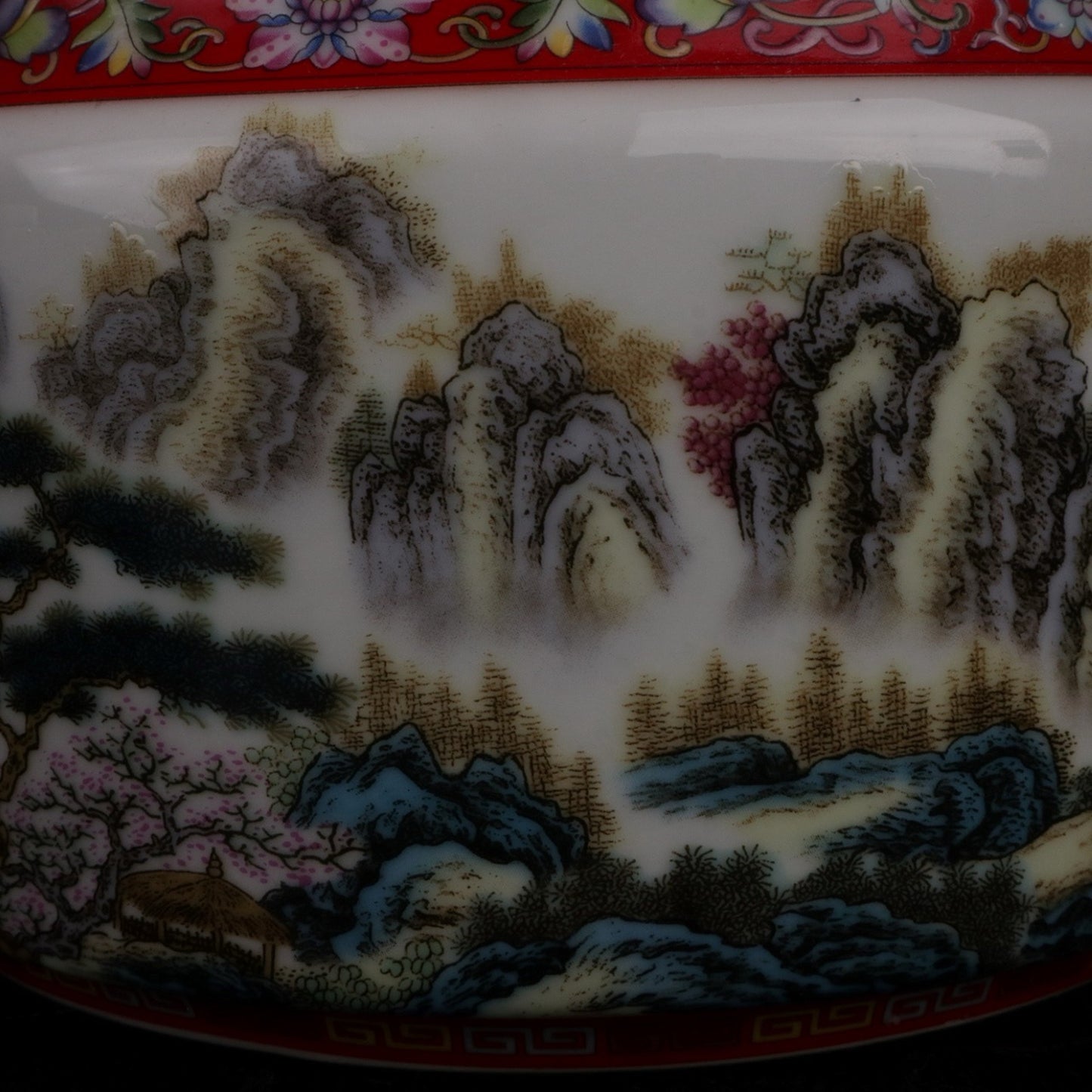 Pink landscape picture and text red roof jar