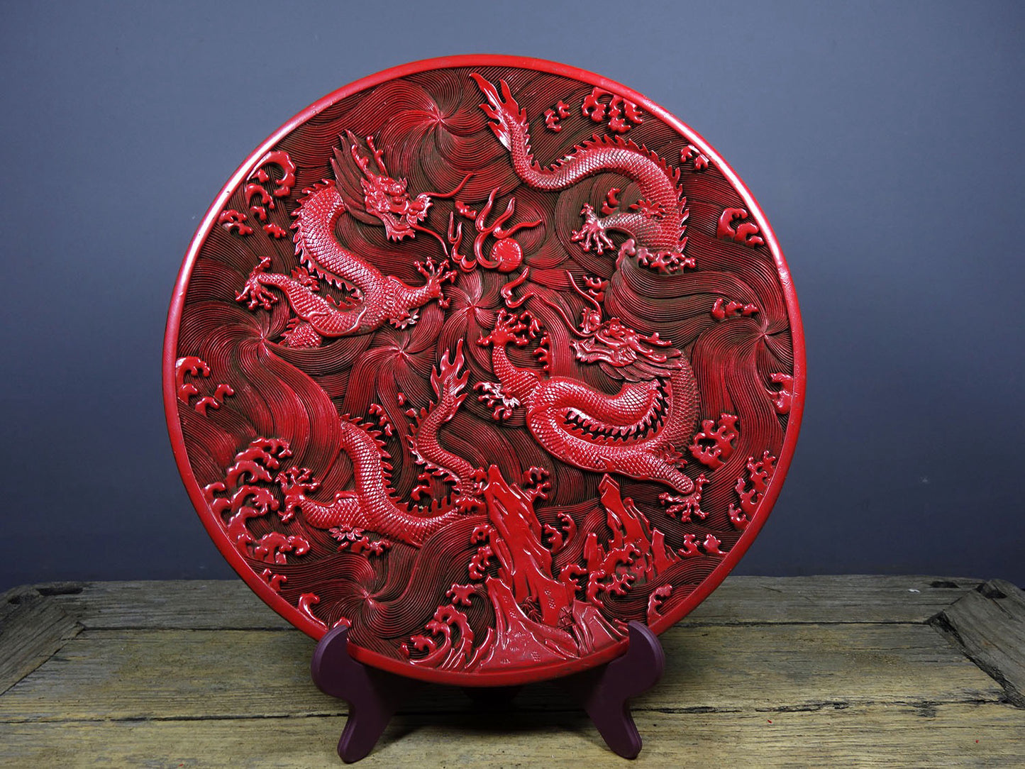Chinese antique lacquerware with red carved plates