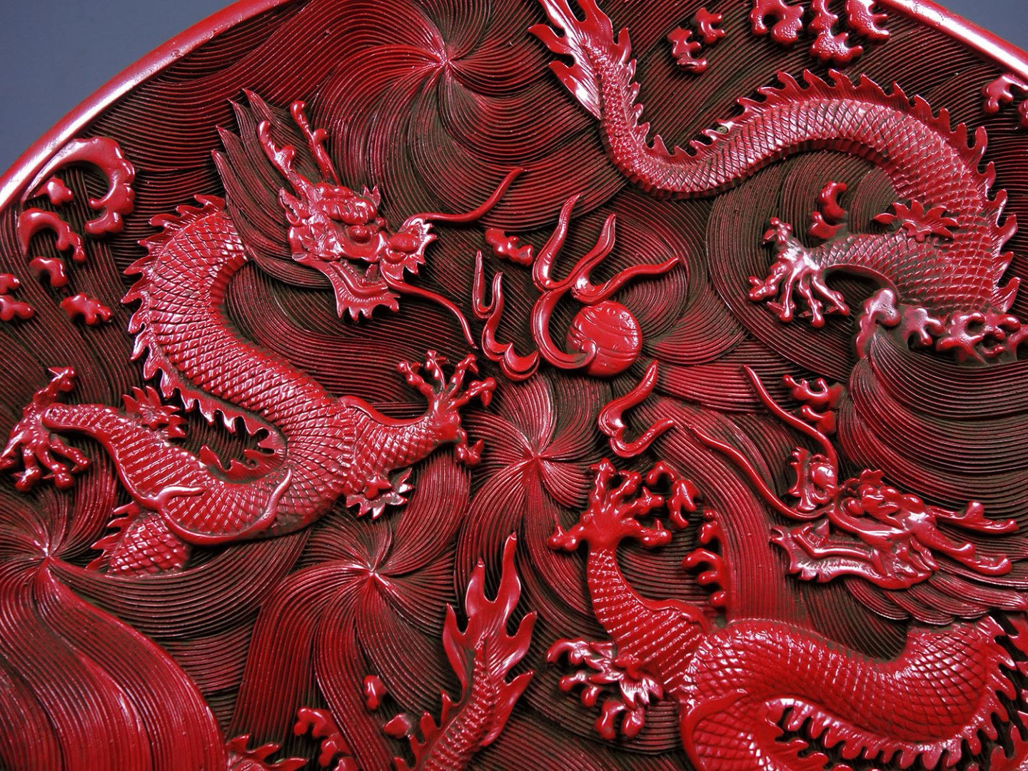 Chinese antique lacquerware with red carved plates