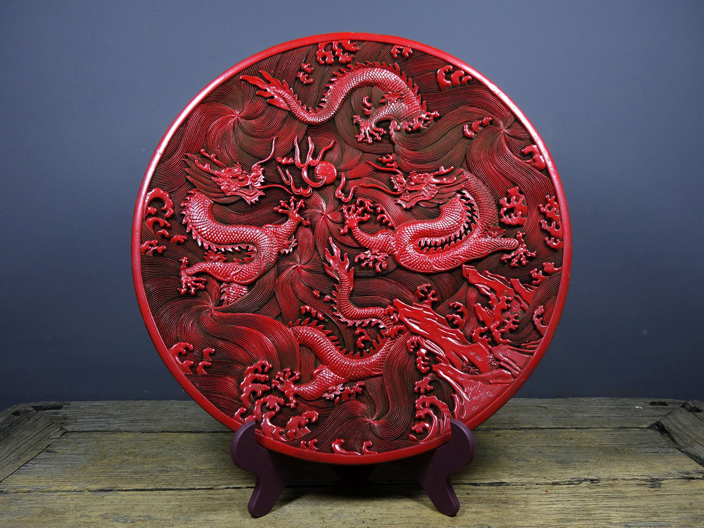 Chinese antique lacquerware with red carved plates