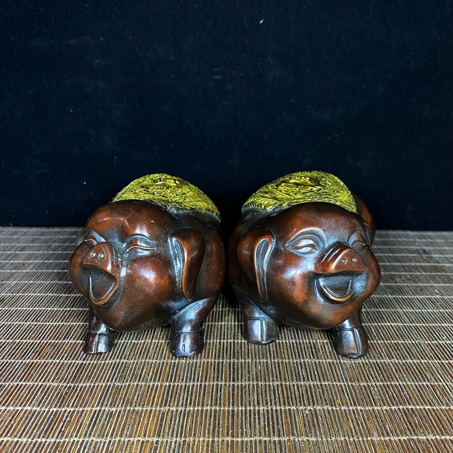 A pair of pure copper gilded and lucky little pigs