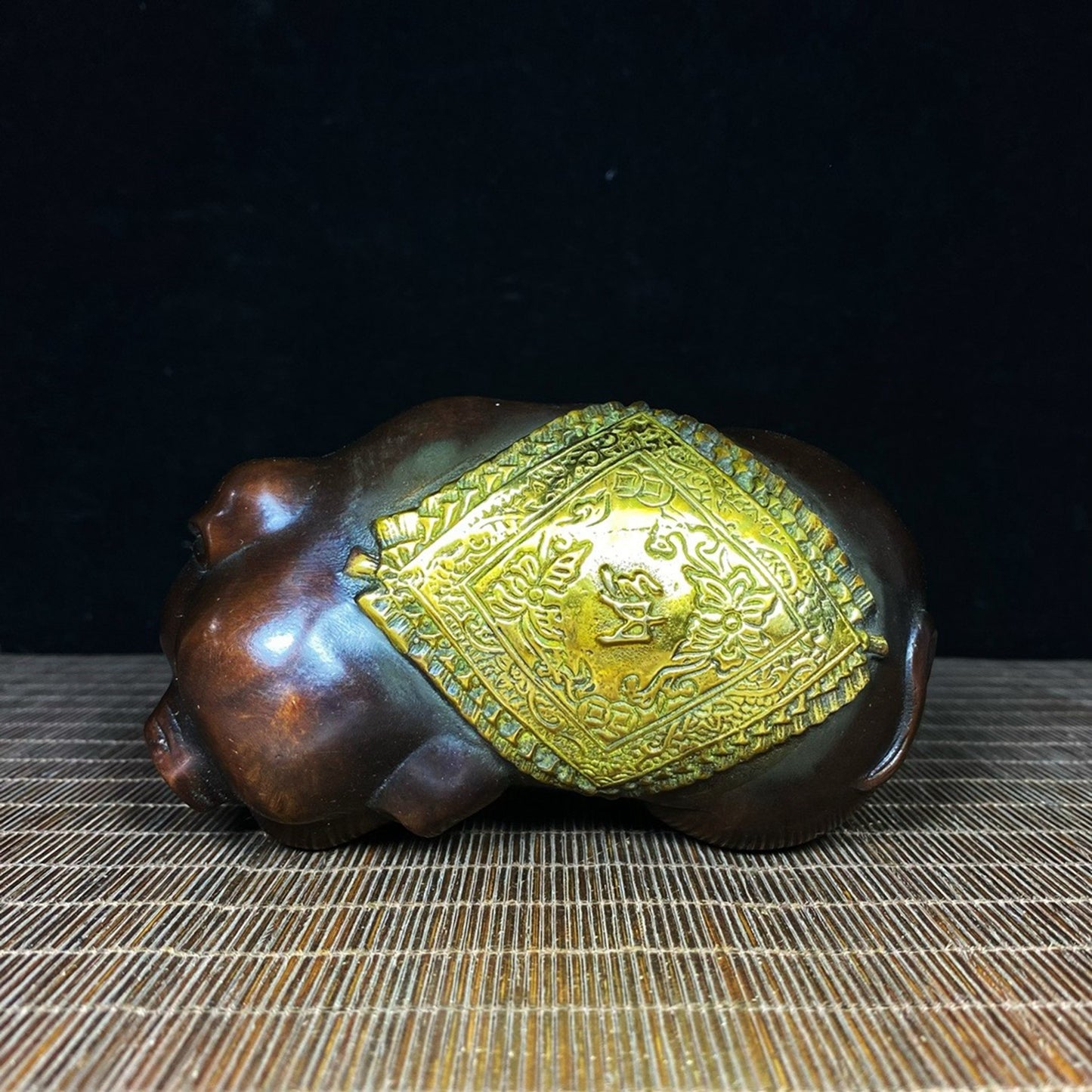 A pair of pure copper gilded and lucky little pigs