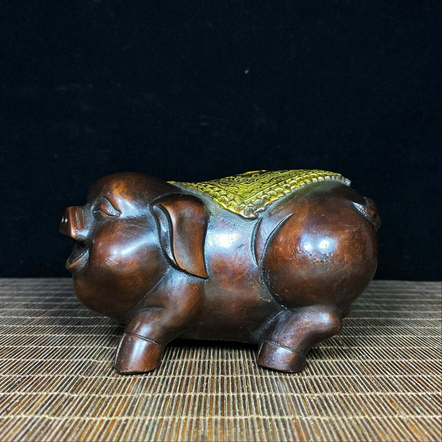 A pair of pure copper gilded and lucky little pigs