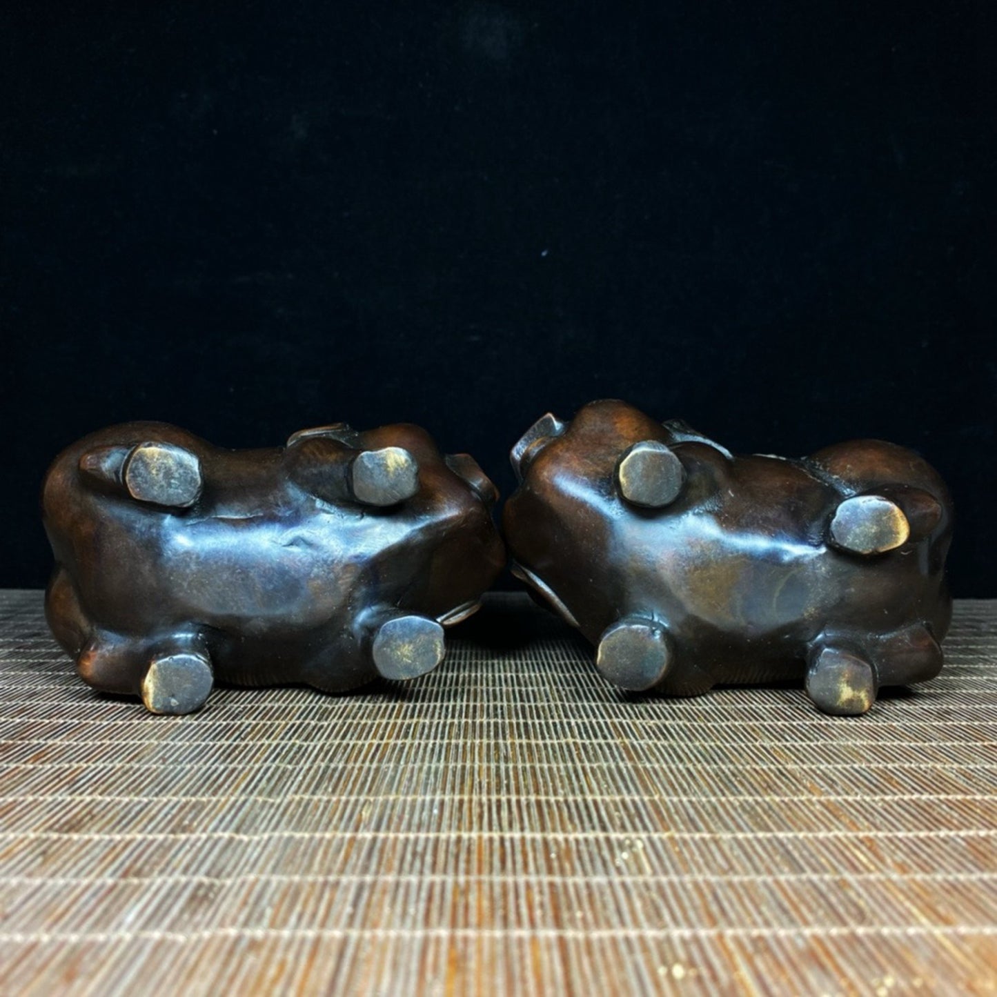 A pair of pure copper gilded and lucky little pigs