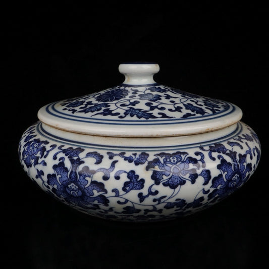 Blue and white entangled branches and lotus patterned tea cake lid jar