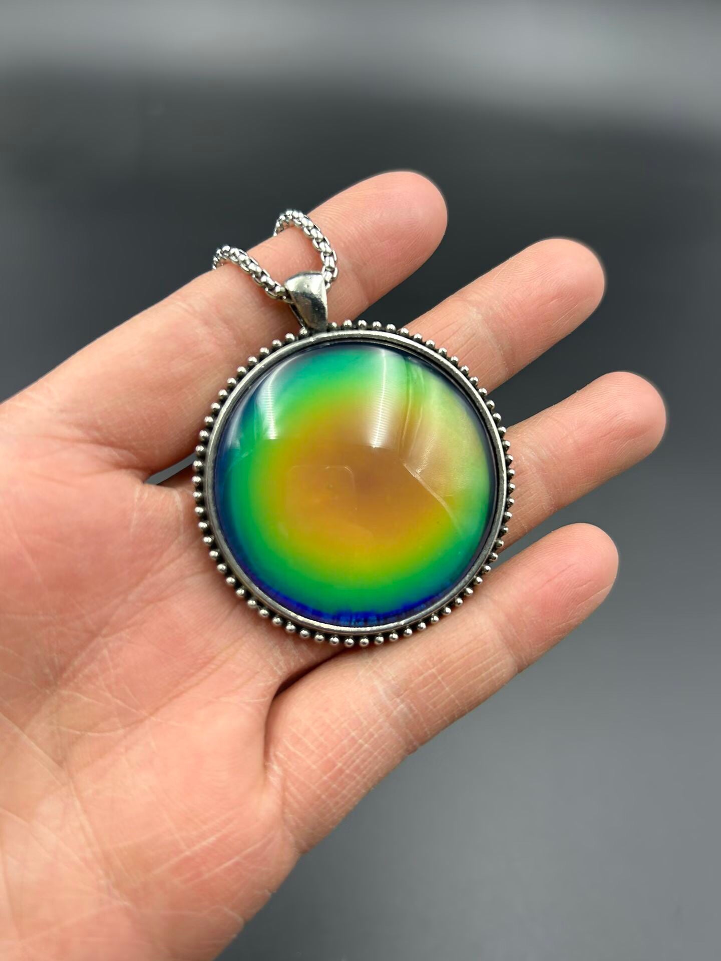 Chinese antique copper temperature sensitive color changing pendant