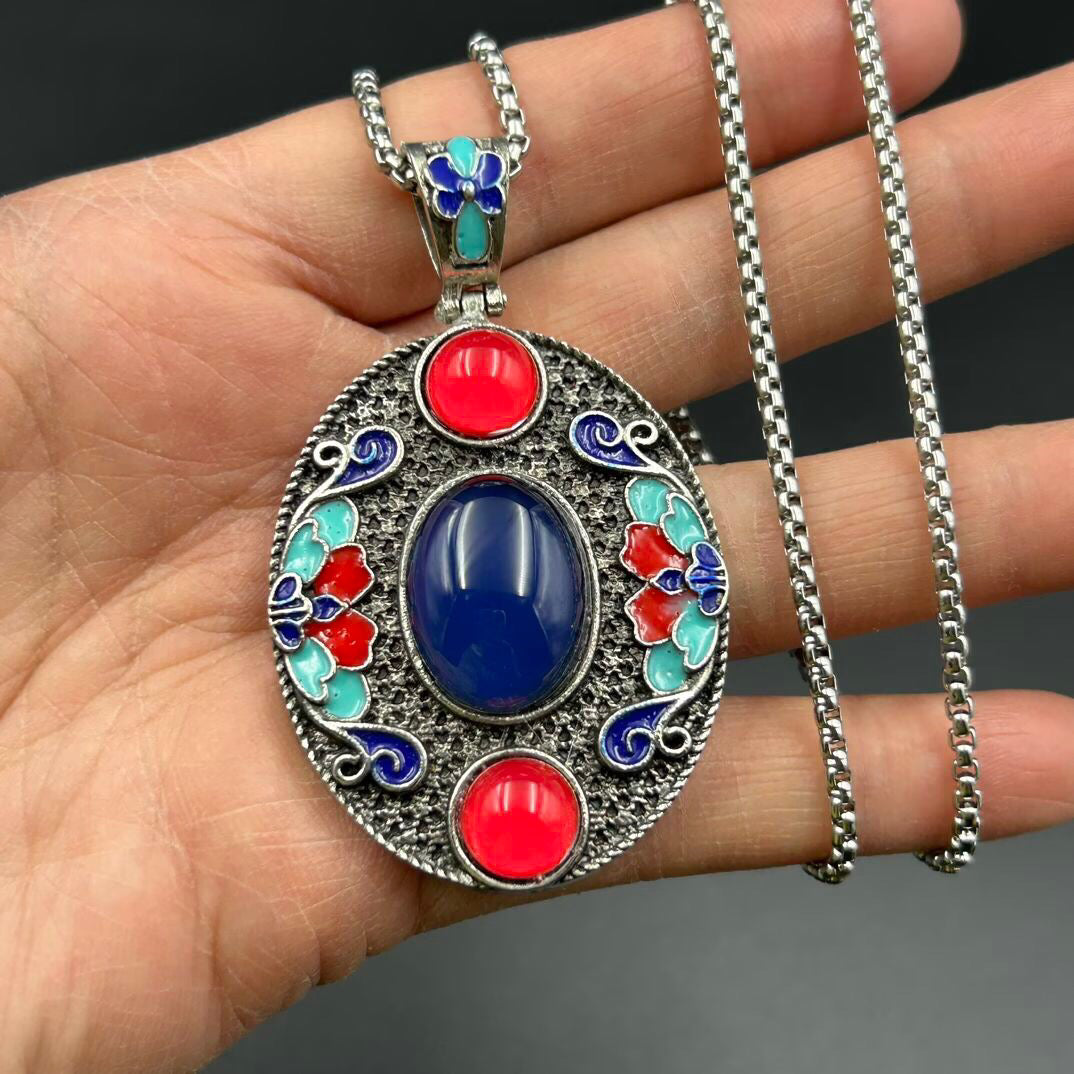 Chinese antique bronze cloisonn é temperature sensitive color changing pendant