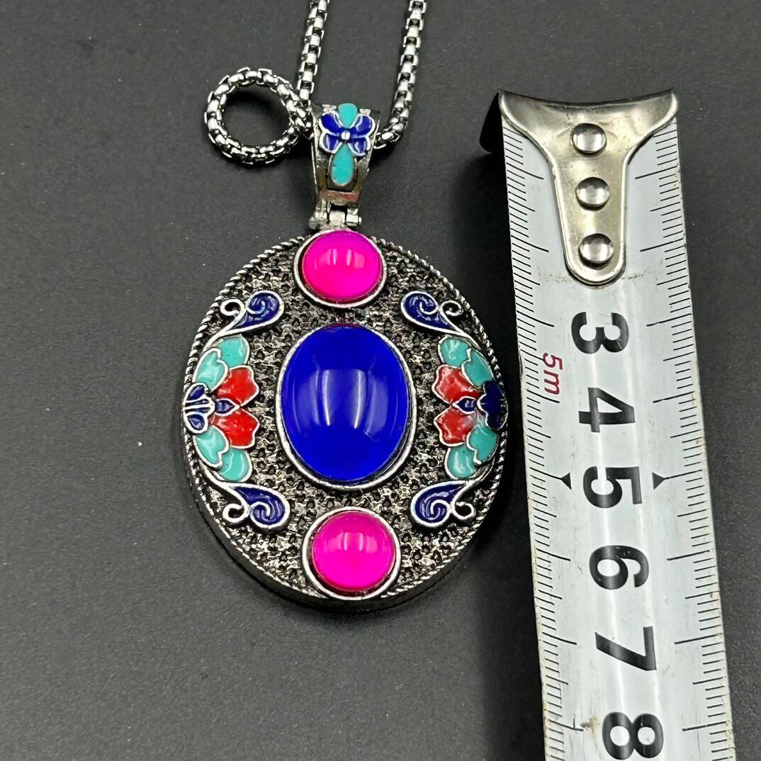 Chinese antique bronze cloisonn é temperature sensitive color changing pendant