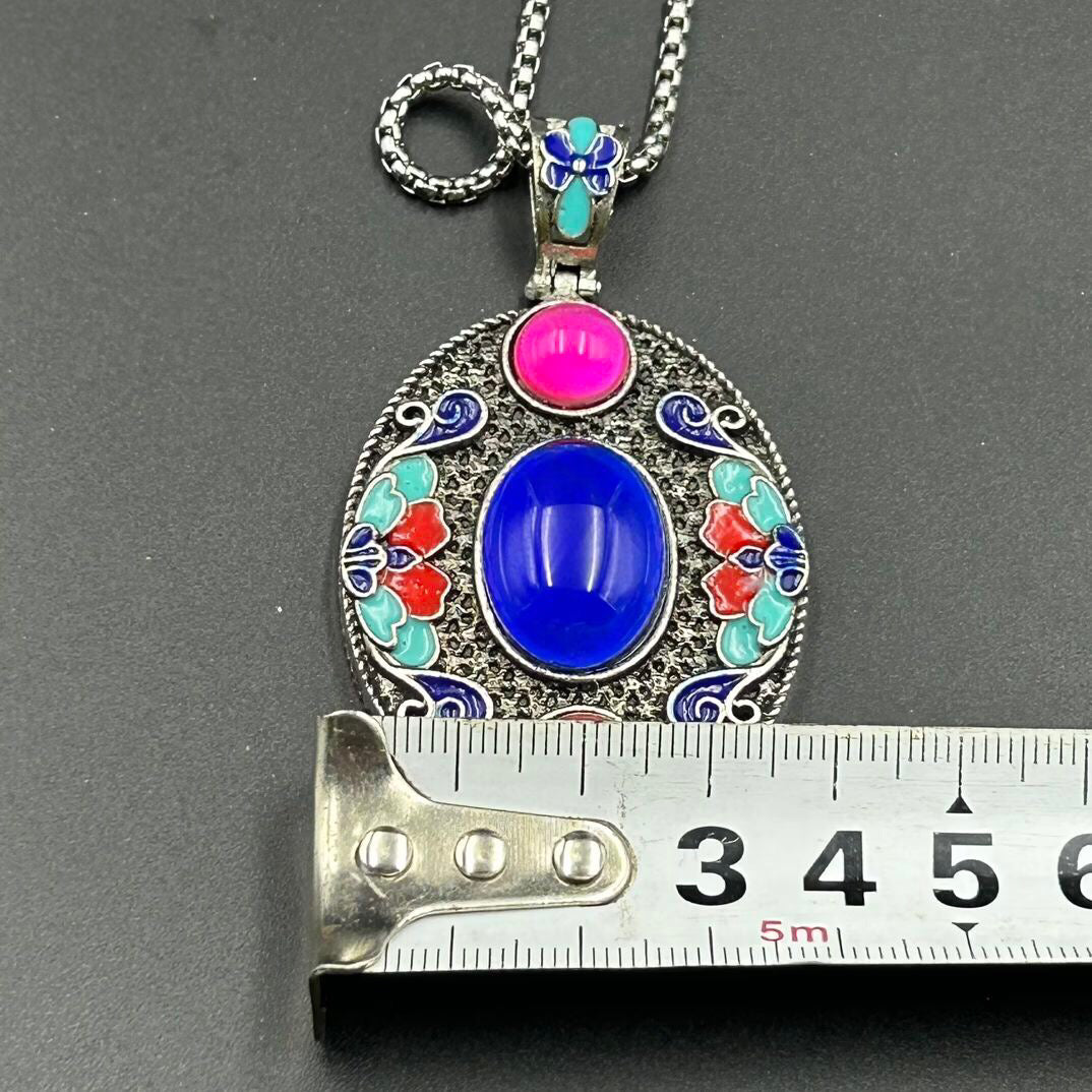 Chinese antique bronze cloisonn é temperature sensitive color changing pendant