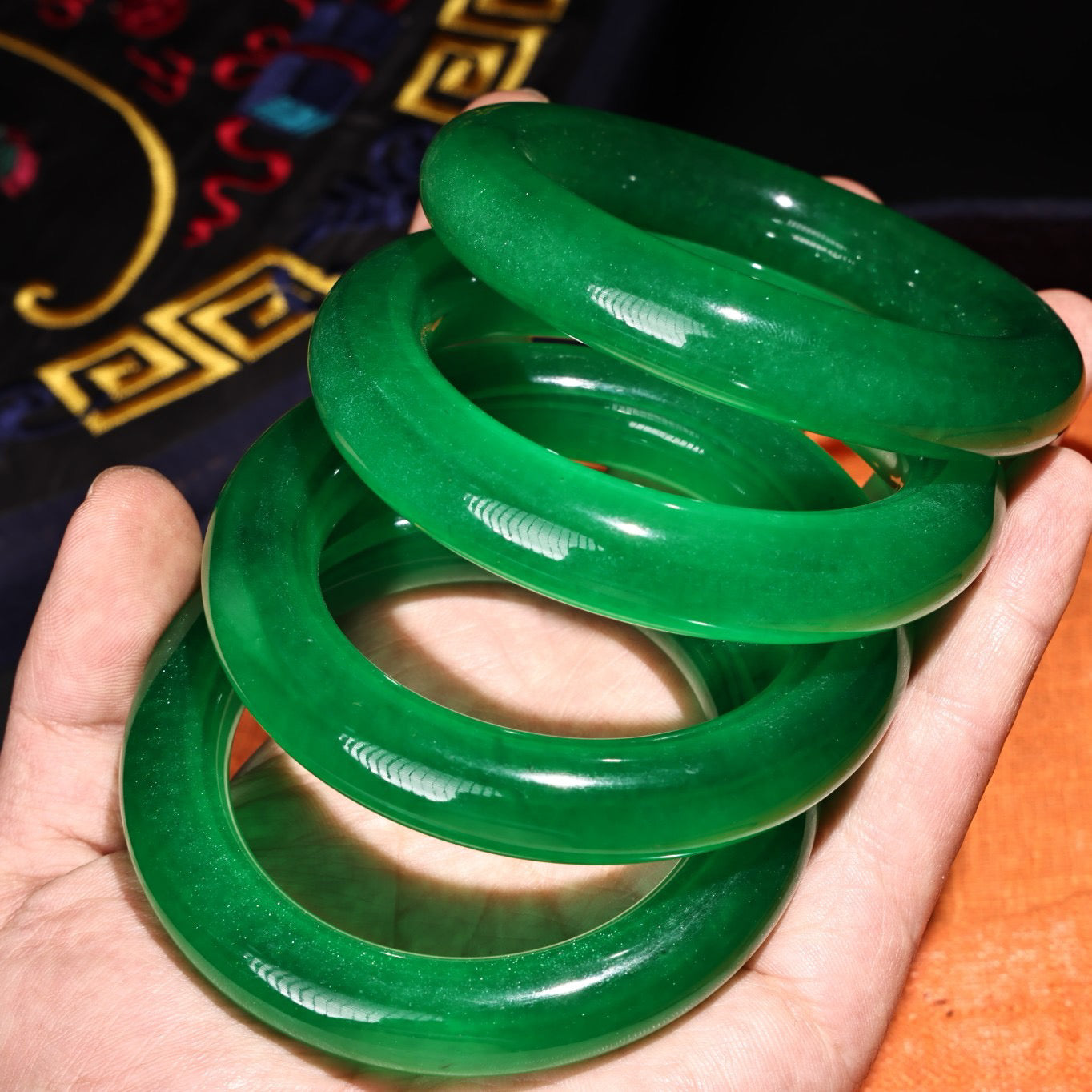 A box of Chinese antique green jadeite jade bracelets