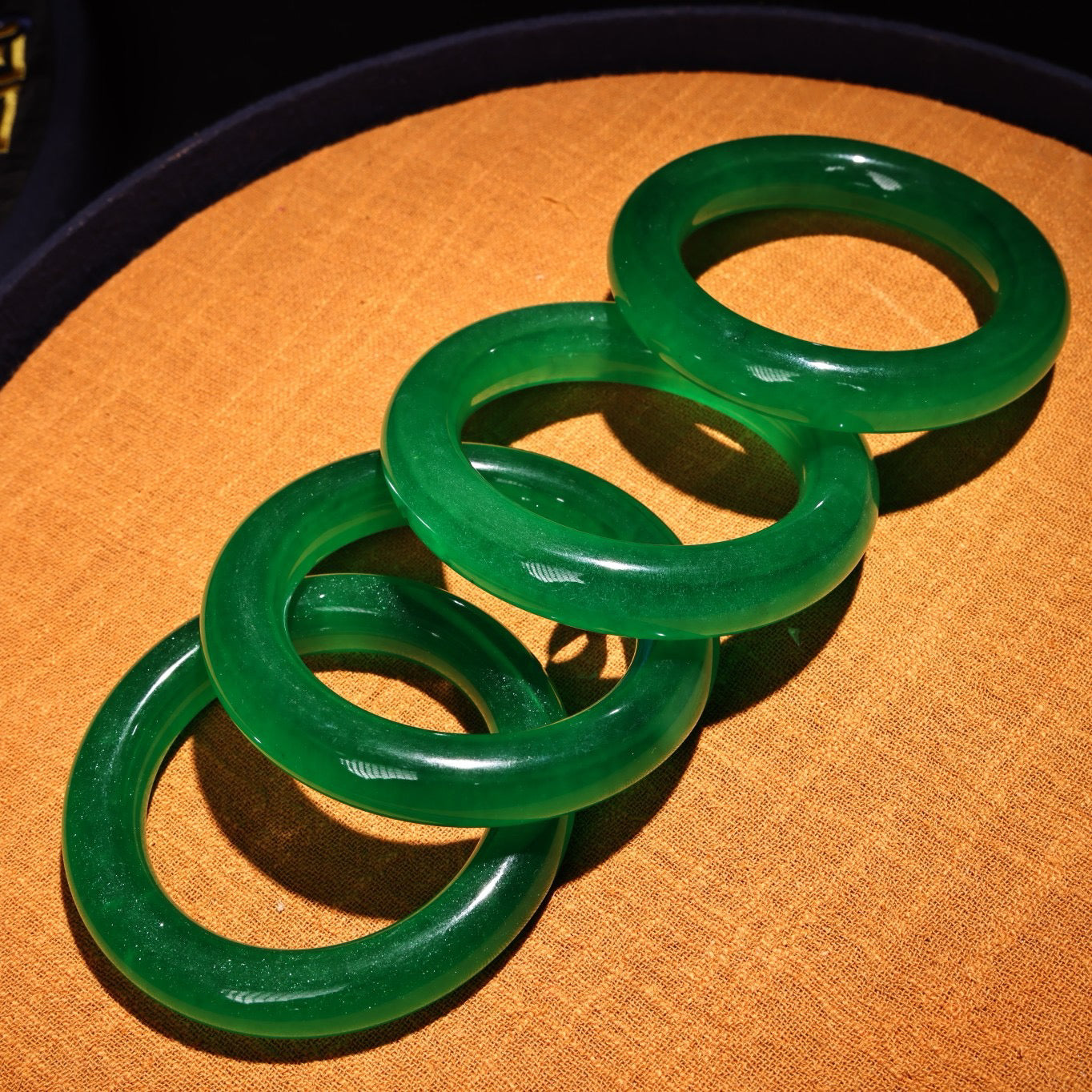 A box of Chinese antique green jadeite jade bracelets