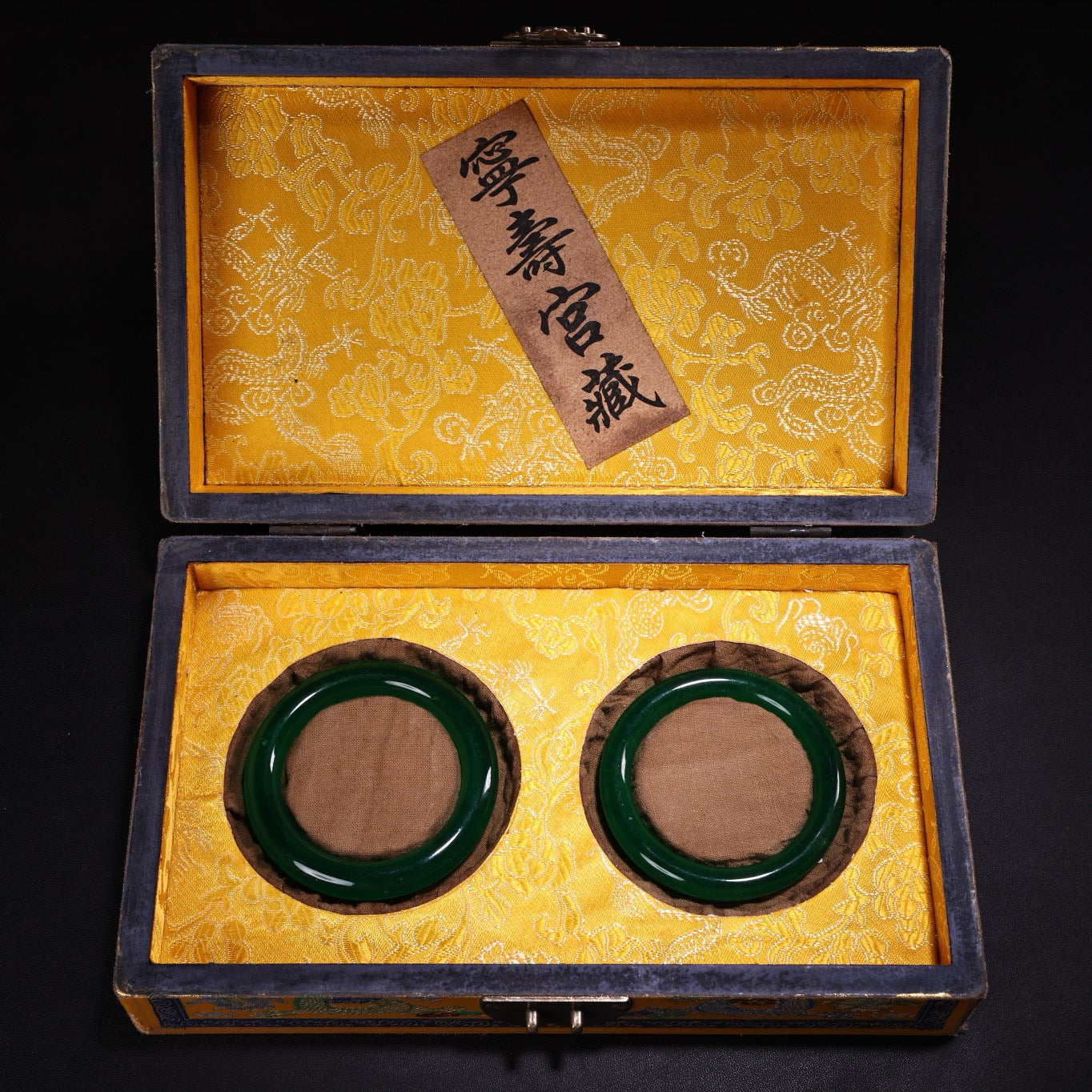 A box of Chinese antique green jadeite jade bracelets