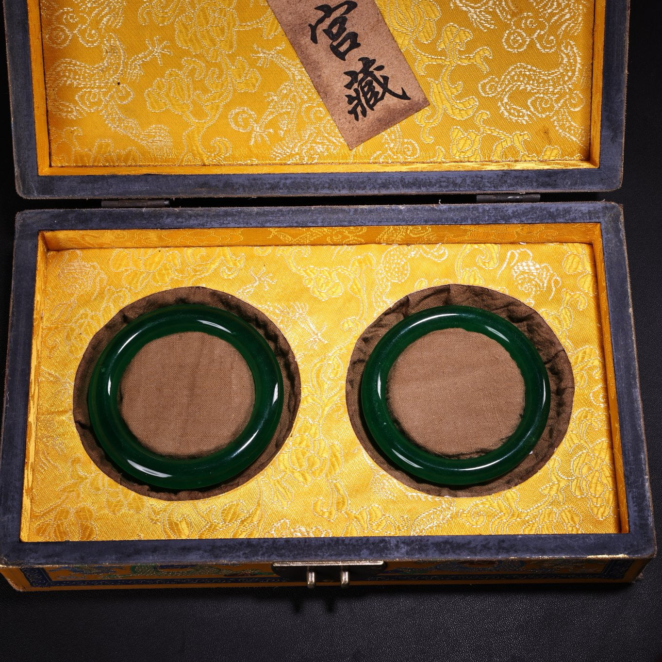 A box of Chinese antique green jadeite jade bracelets