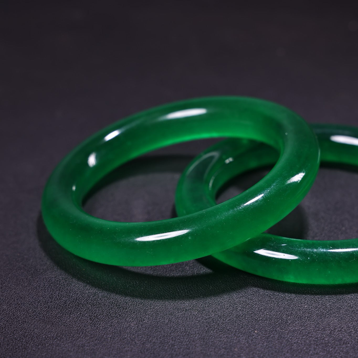 A box of Chinese antique green jadeite jade bracelets