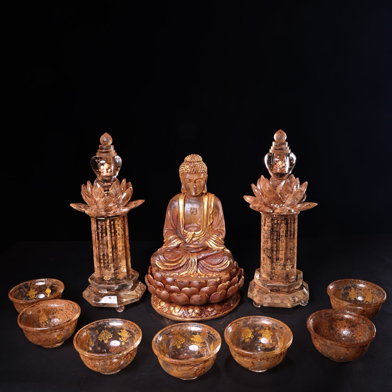 Chinese antique crystal carvings depicting Shakyamuni Buddha in gold