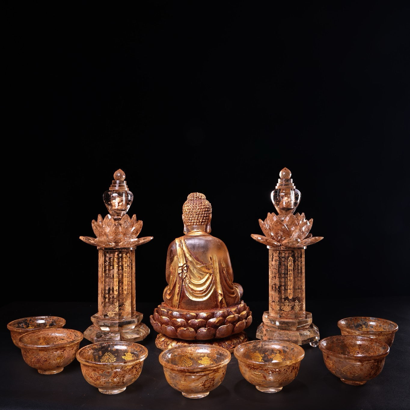 Chinese antique crystal carvings depicting Shakyamuni Buddha in gold