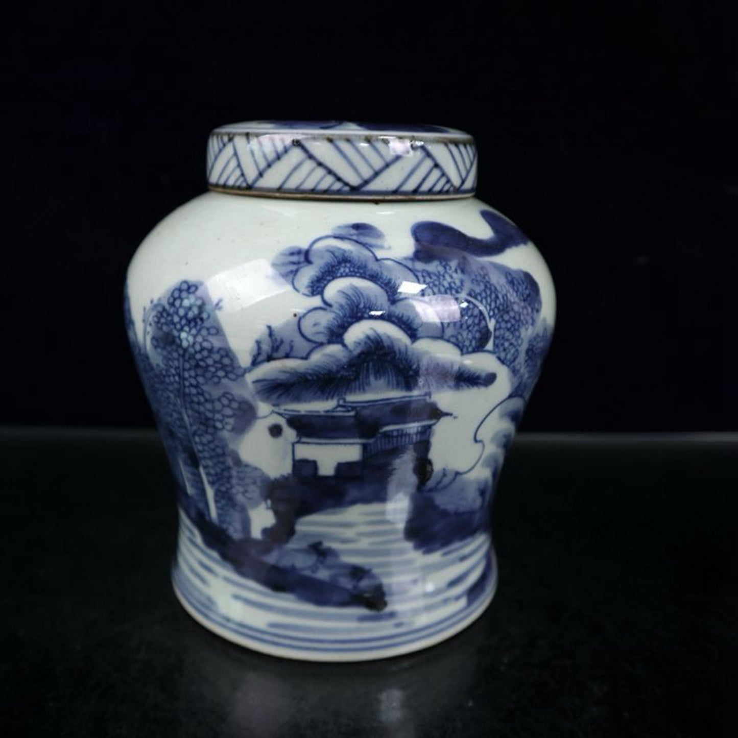 Blue and white landscape patterned covered jar