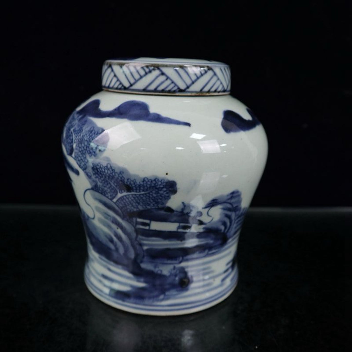 Blue and white landscape patterned covered jar