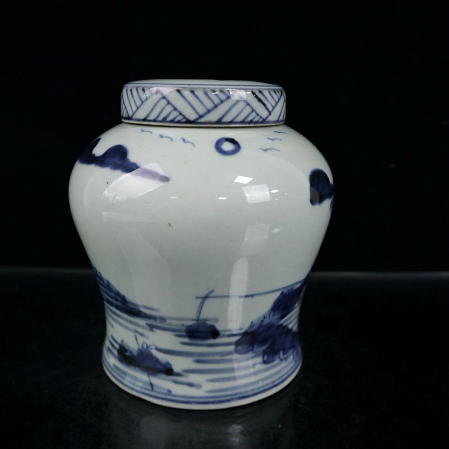 Blue and white landscape patterned covered jar