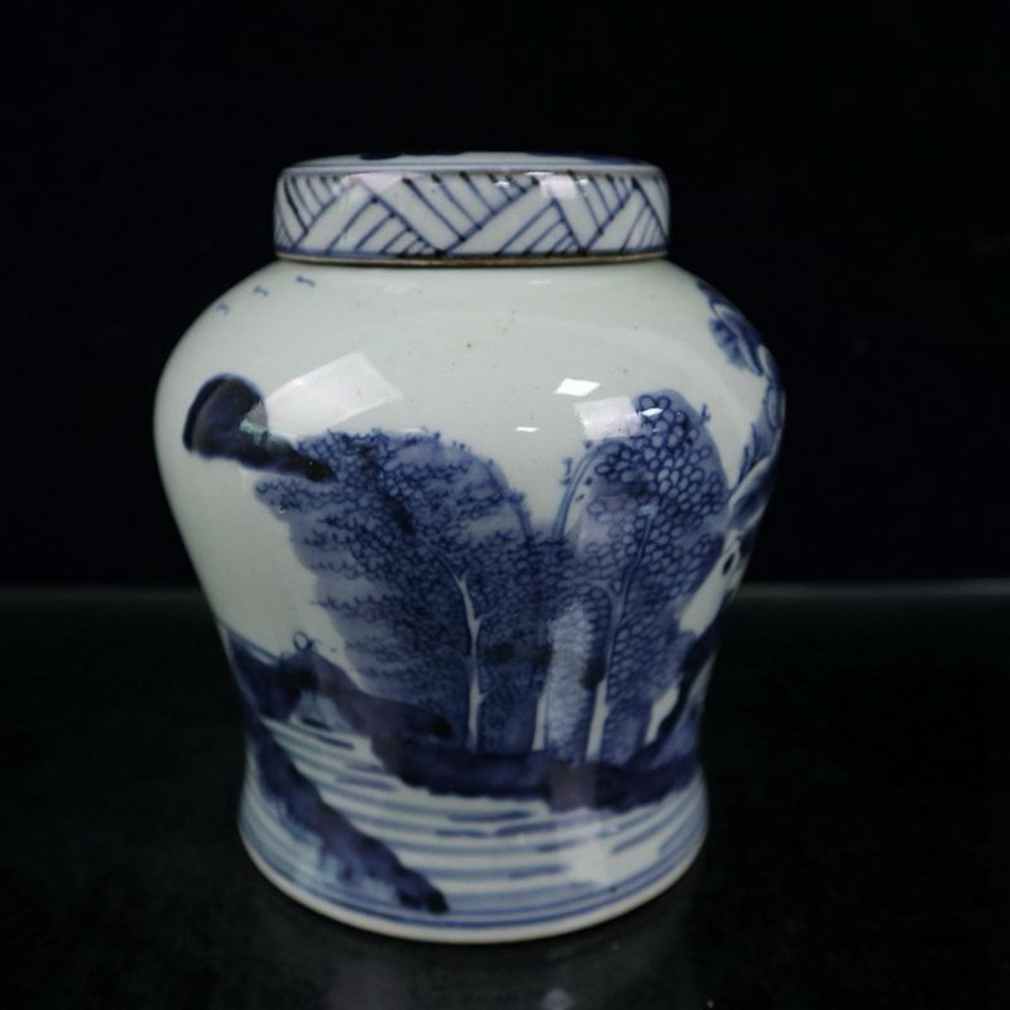 Blue and white landscape patterned covered jar