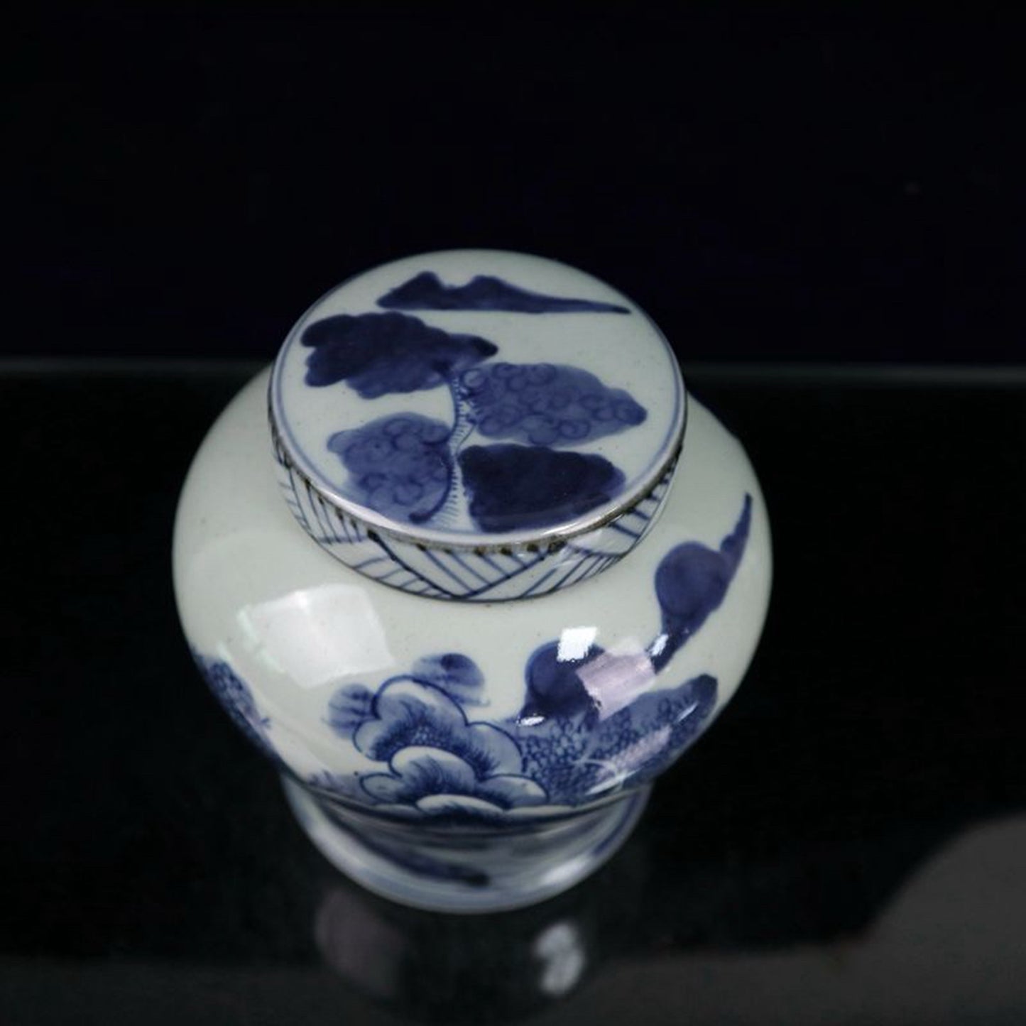 Blue and white landscape patterned covered jar