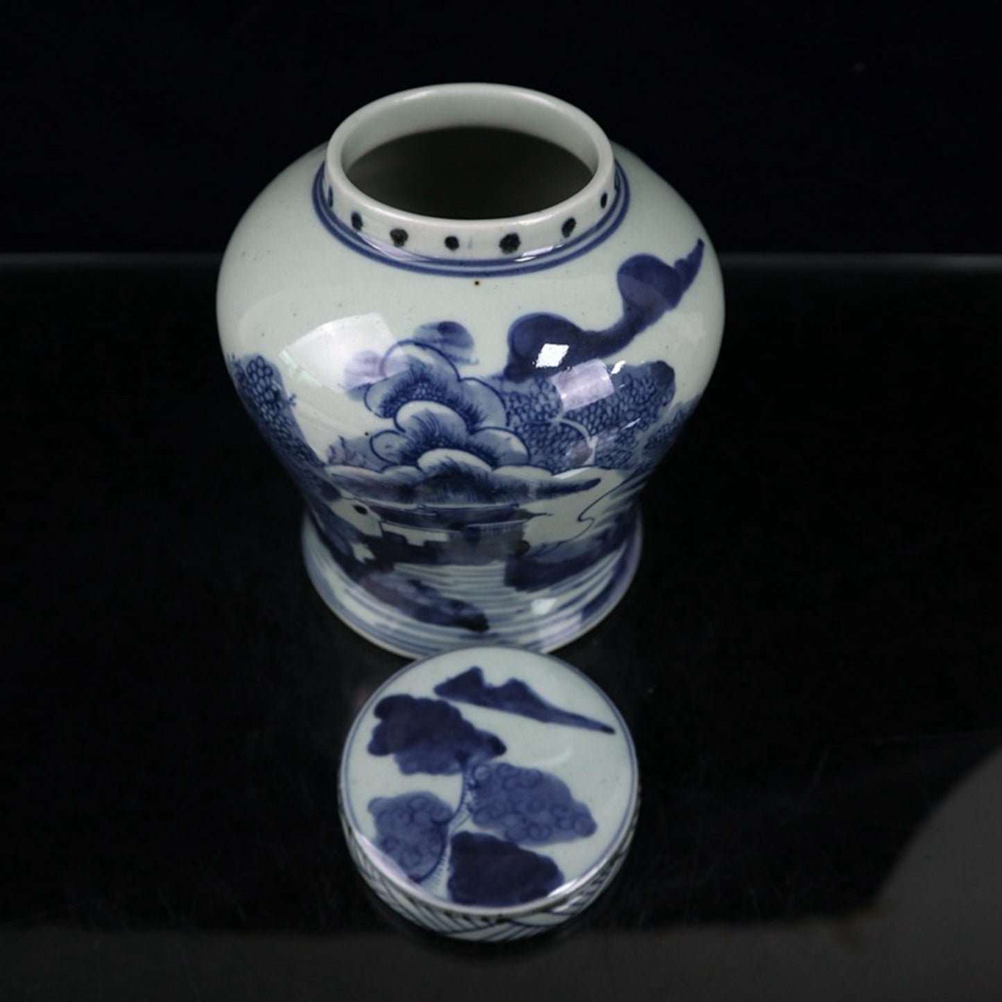 Blue and white landscape patterned covered jar