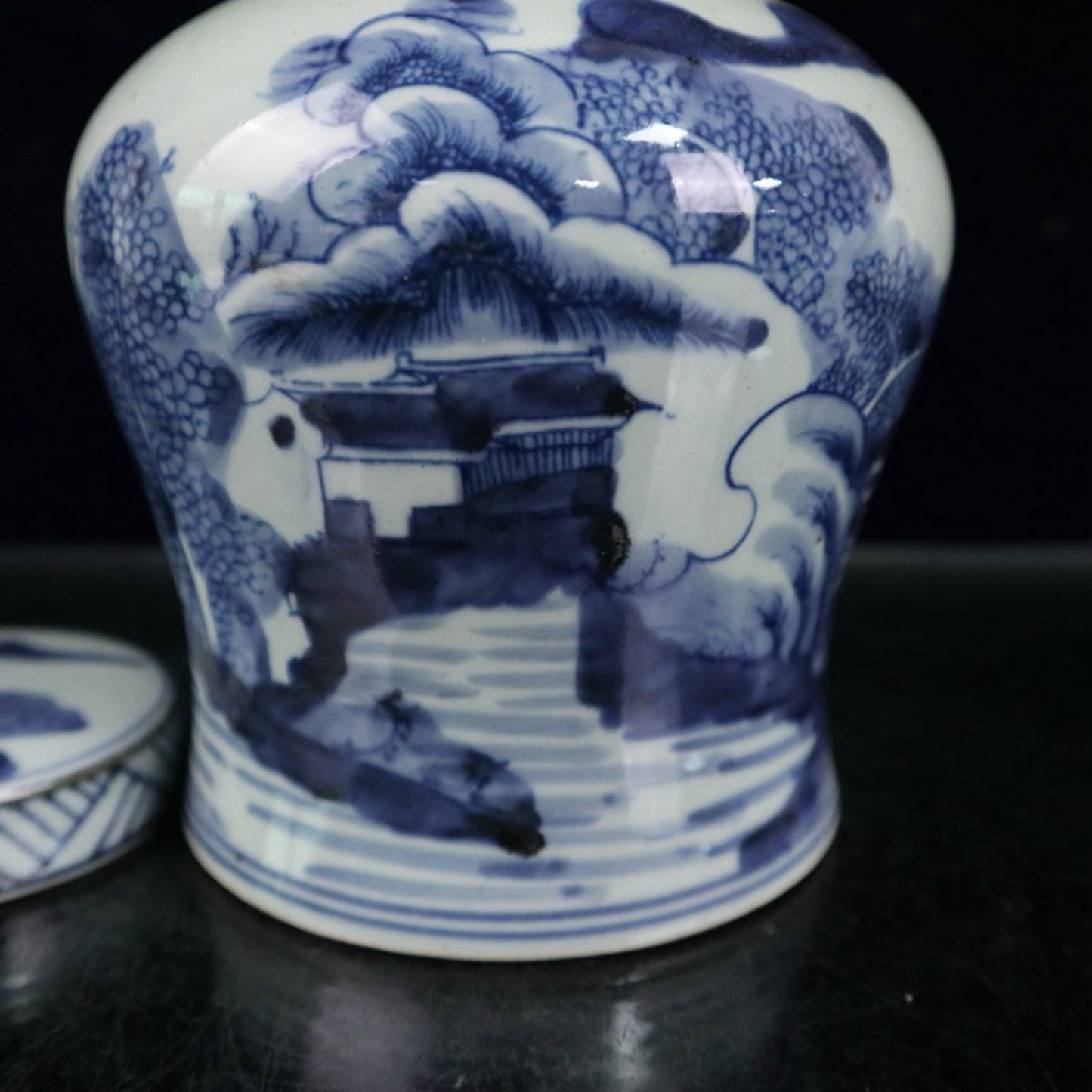Blue and white landscape patterned covered jar