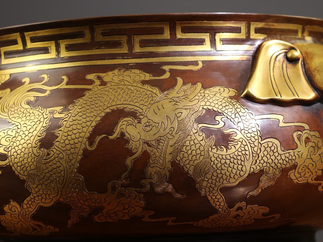 [Carving gluttonous patterns (double dragons playing with pearls), elephant trunk, double ears, large incense burner]