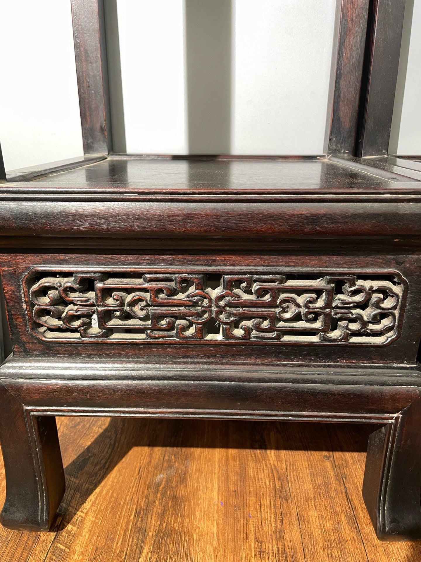 A pair of rosewood flowers