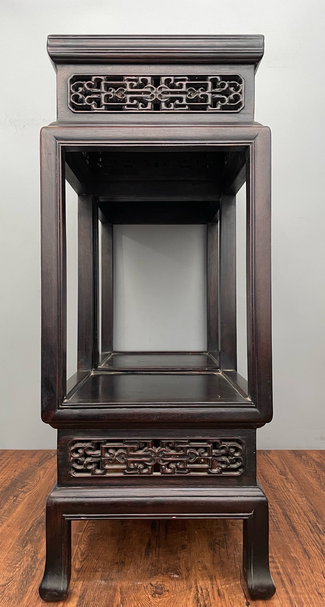 A pair of rosewood flowers