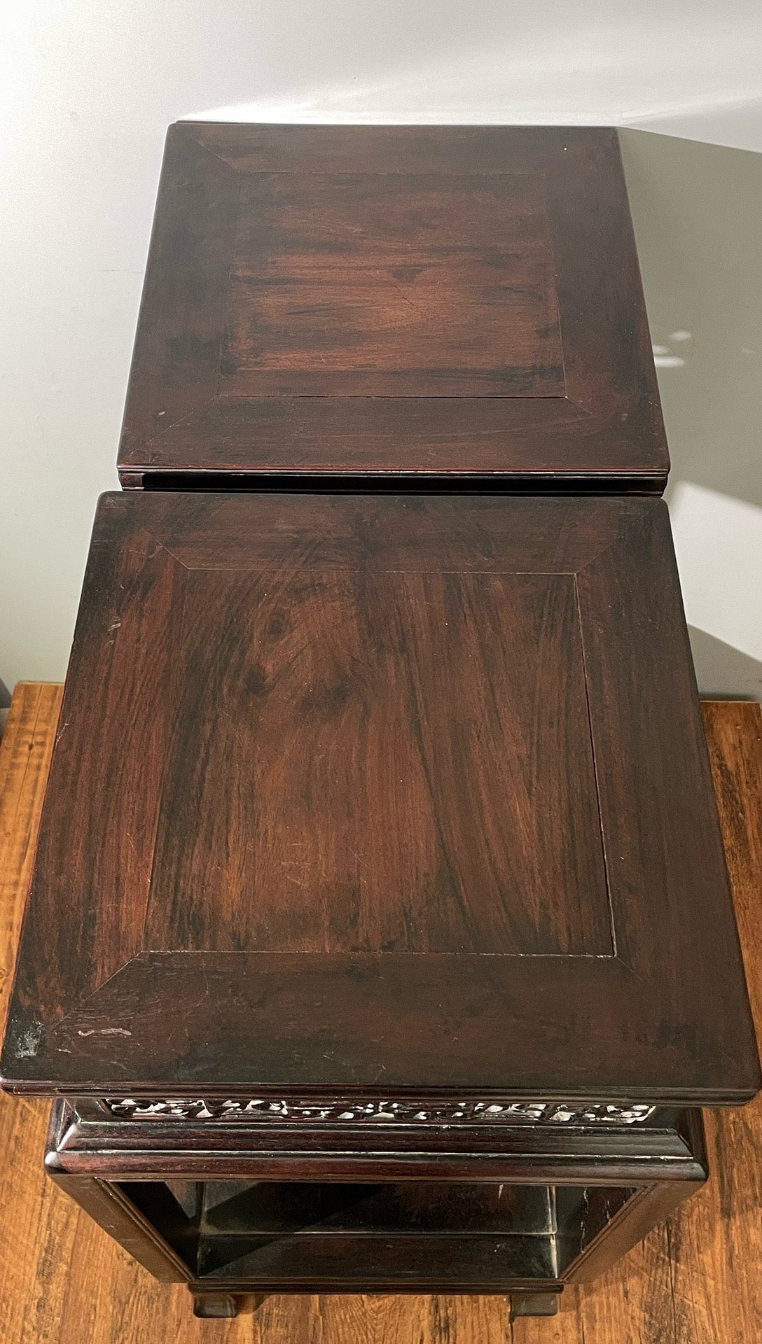 A pair of rosewood flowers