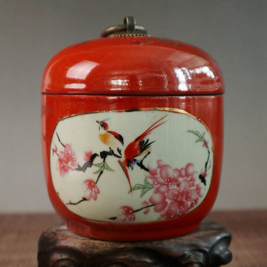 Red glazed double-sided window with flower and bird pattern lid jar