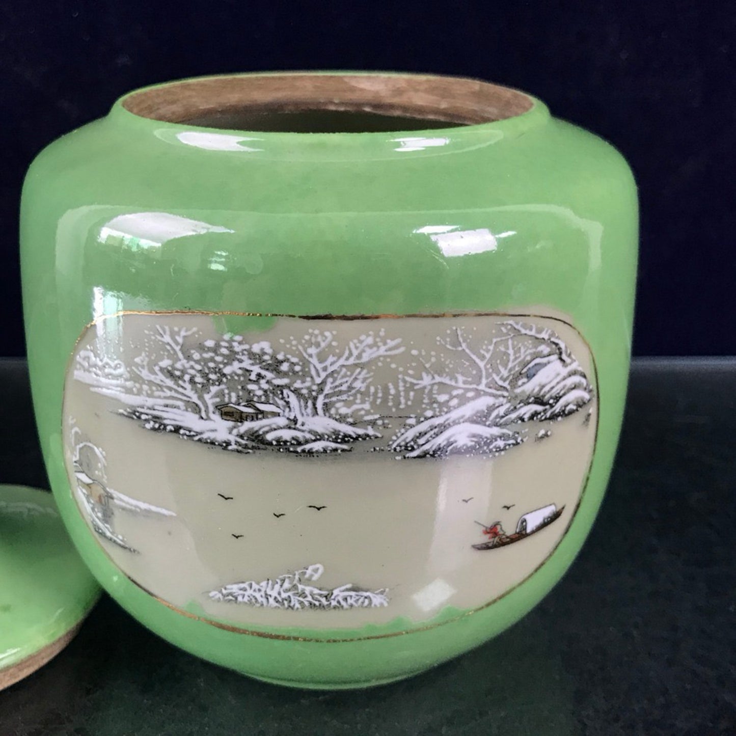 Green glazed open window jar with flower and bird pattern lid