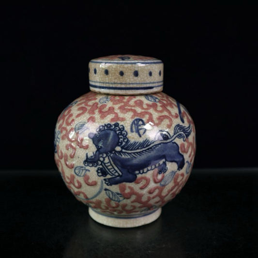 Open piece blue and white glazed red lion patterned lid jar