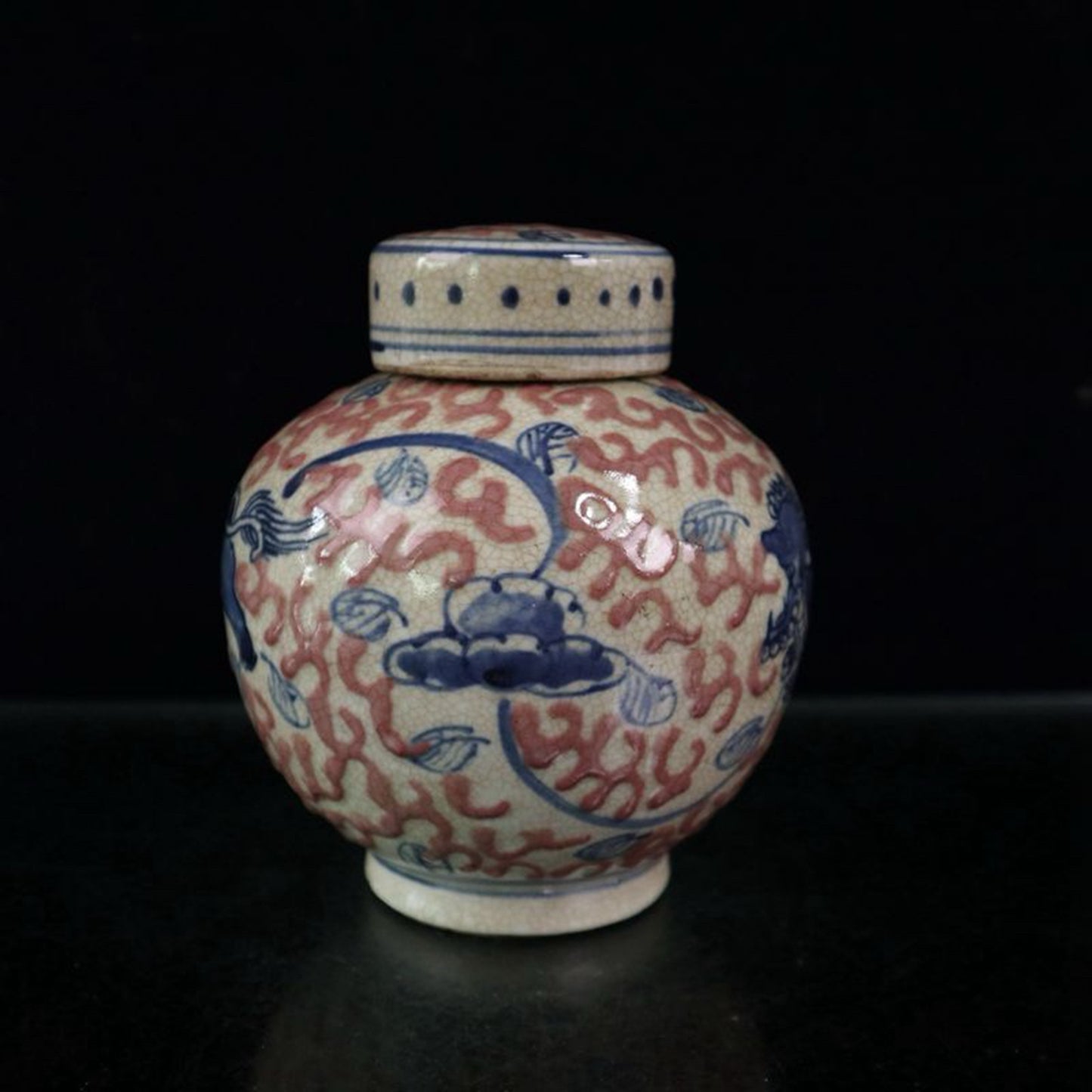 Open piece blue and white glazed red lion patterned lid jar