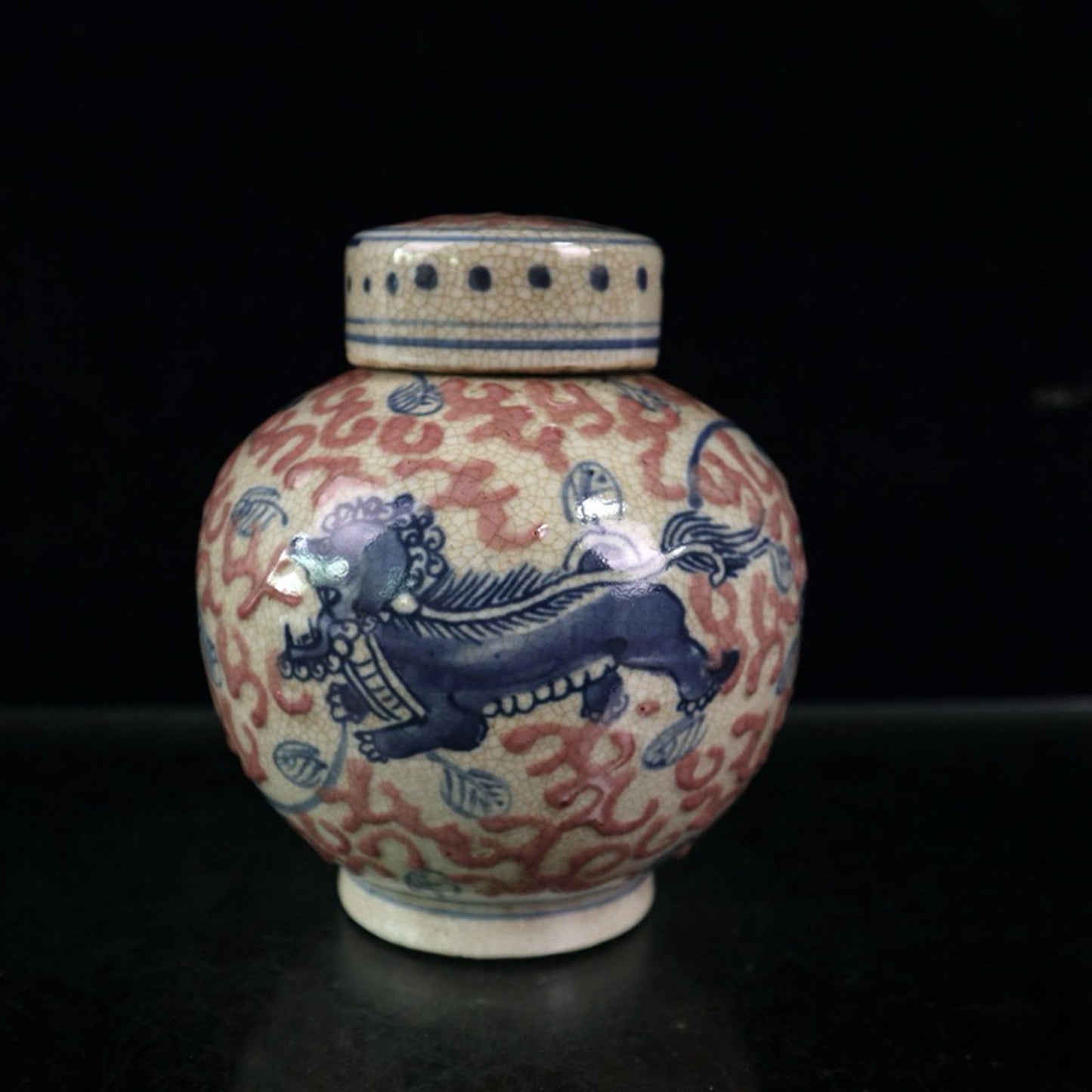 Open piece blue and white glazed red lion patterned lid jar
