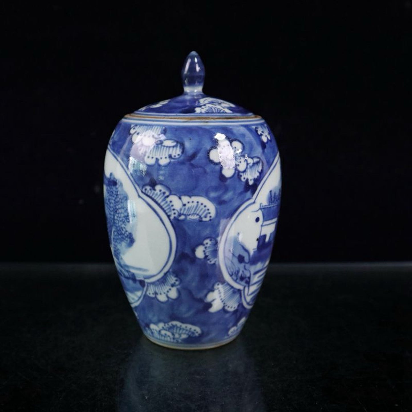 Blue and white ice plum patterned mountain and water patterned lid jar