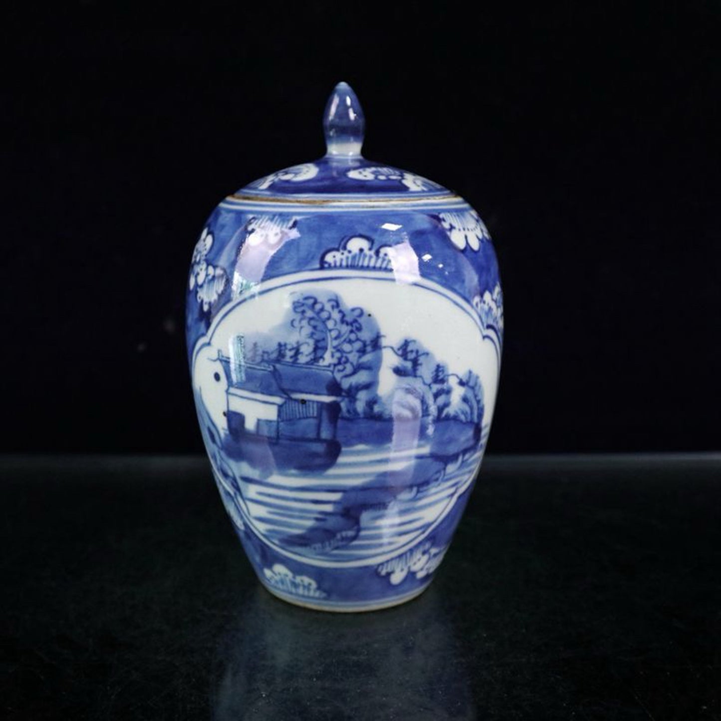 Blue and white ice plum patterned mountain and water patterned lid jar