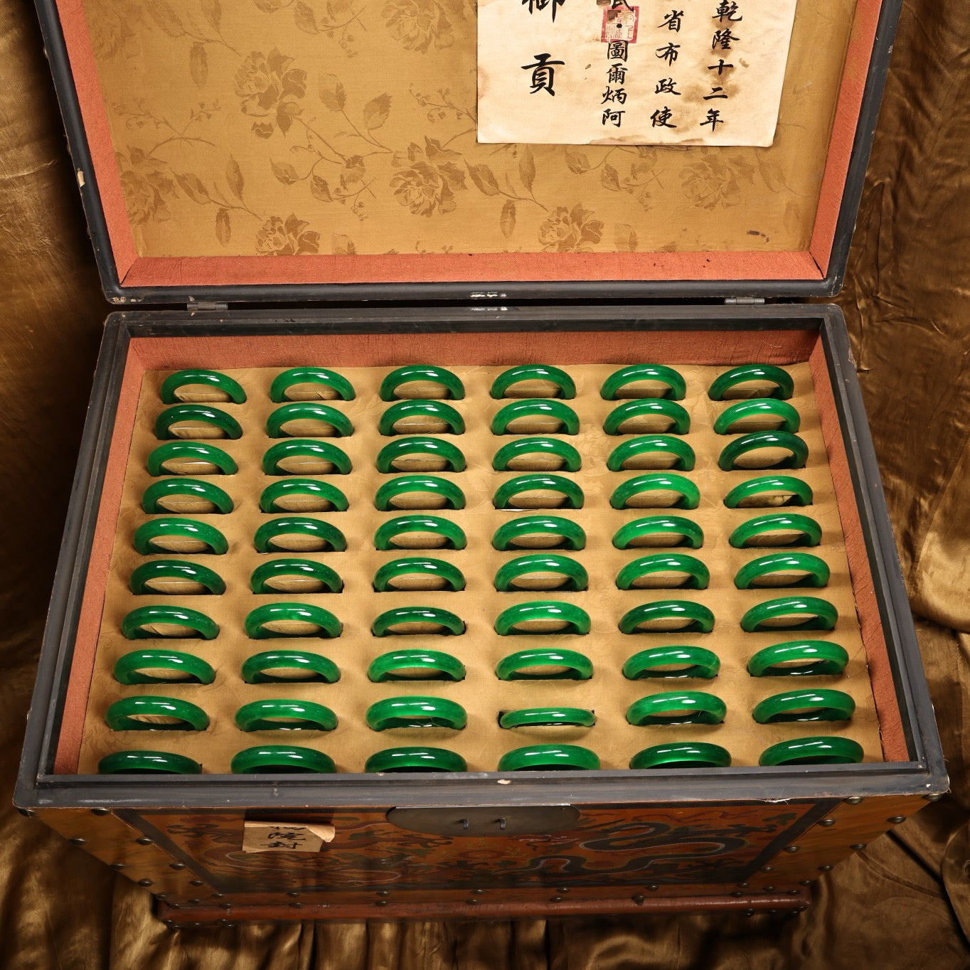 A box of Chinese antique jade bracelets