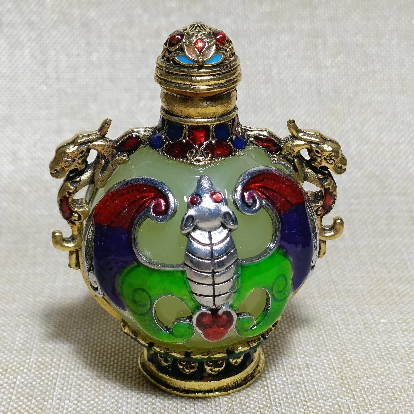 Chinese antique copper inlaid cloisonn é luminous snuff bottle