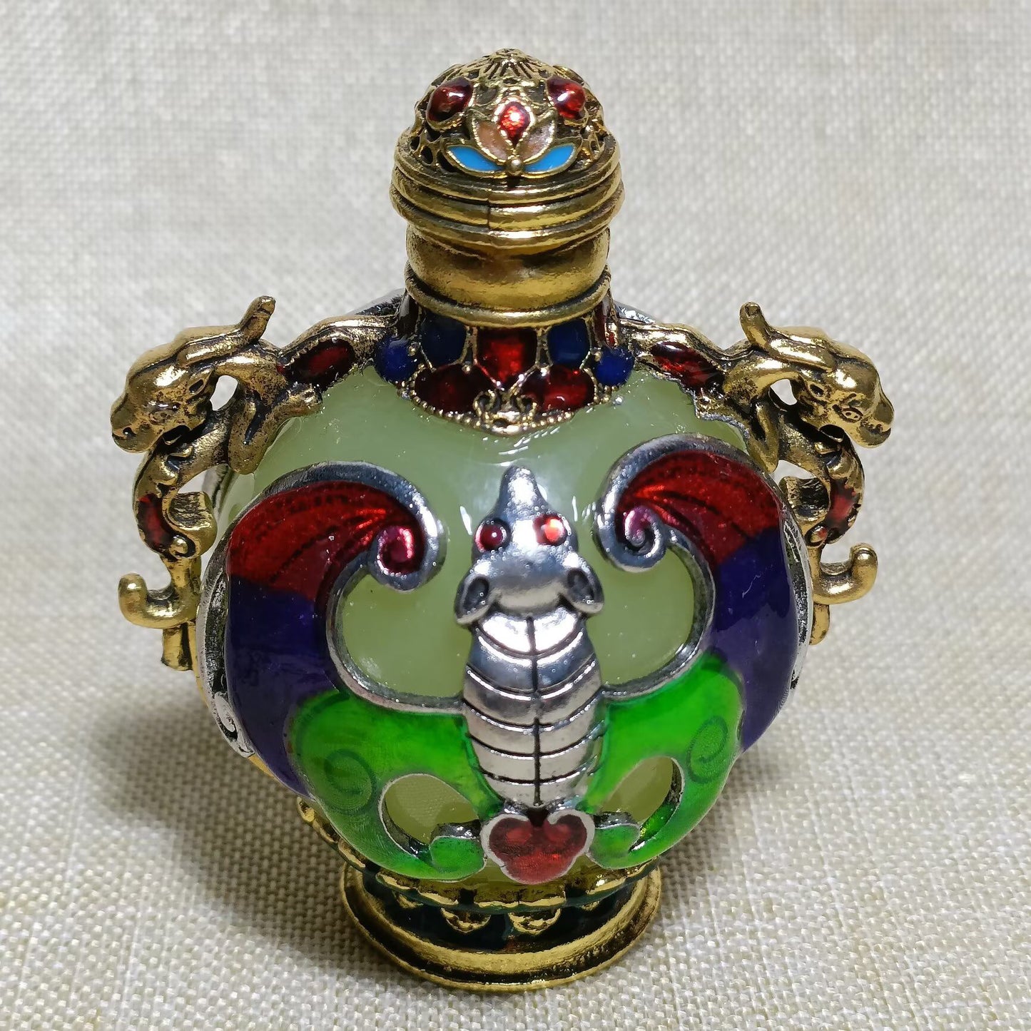 Chinese antique copper inlaid cloisonn é luminous snuff bottle