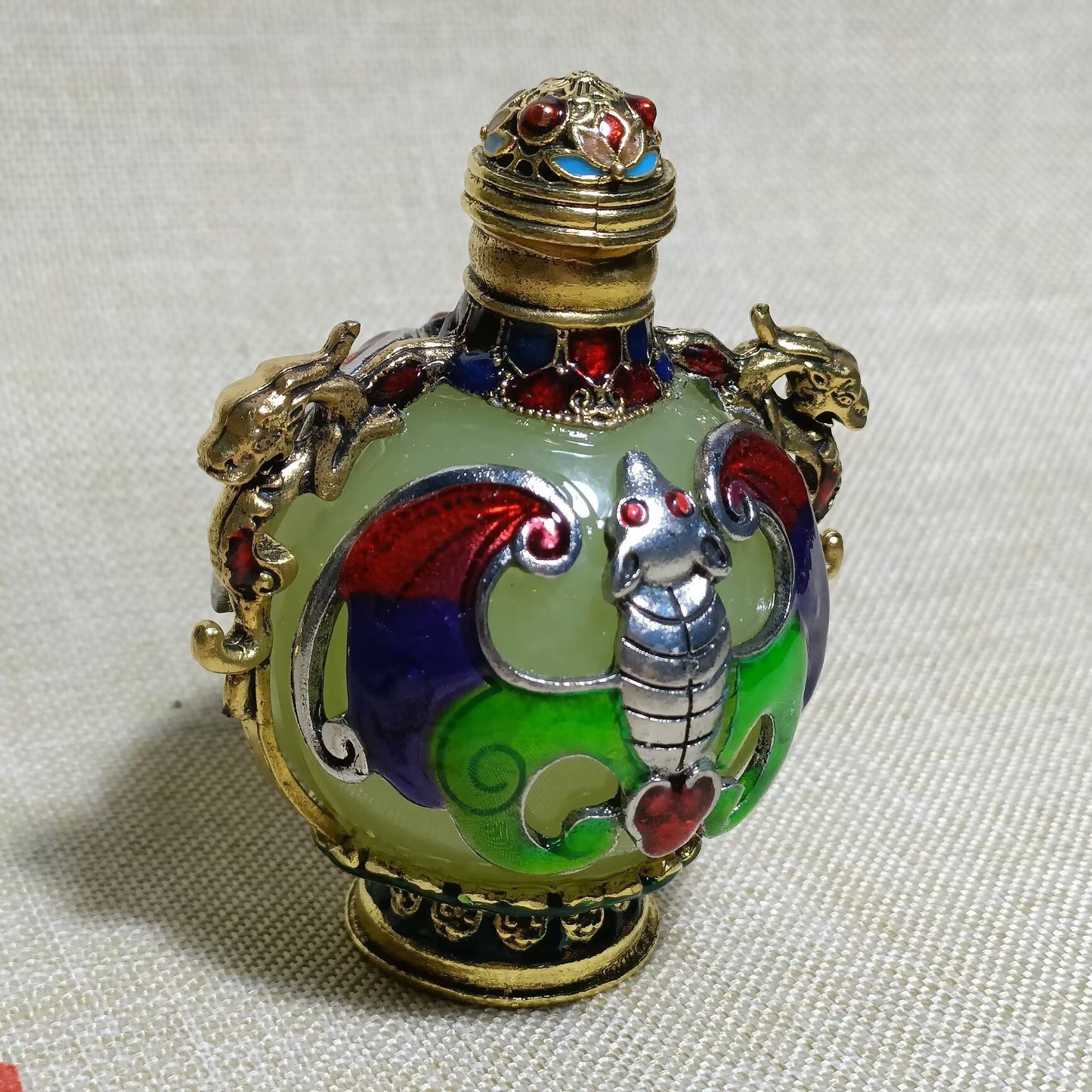 Chinese antique copper inlaid cloisonn é luminous snuff bottle