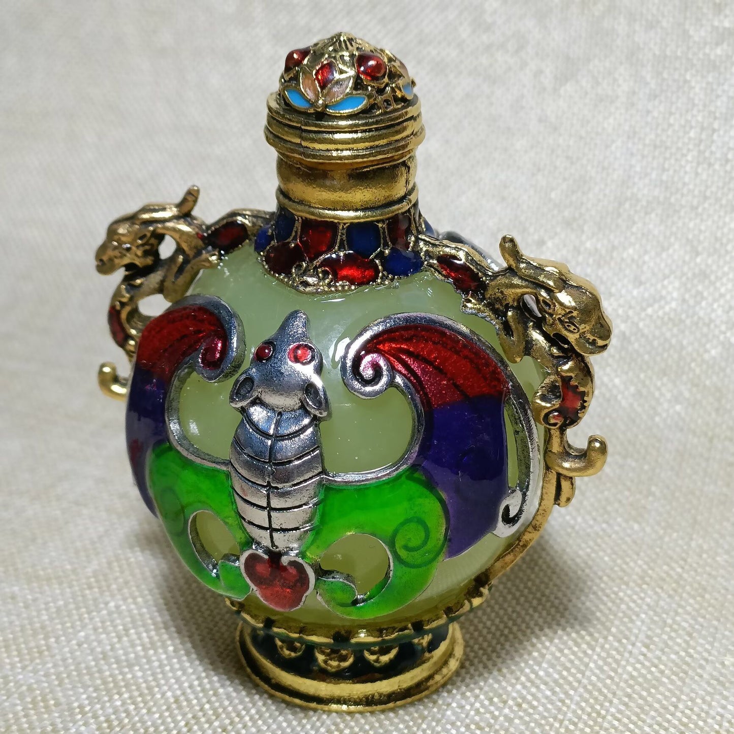 Chinese antique copper inlaid cloisonn é luminous snuff bottle