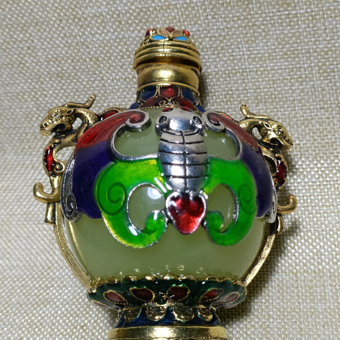 Chinese antique copper inlaid cloisonn é luminous snuff bottle